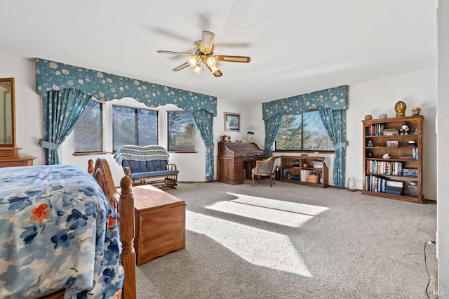 bedroom with ceiling fan and carpet