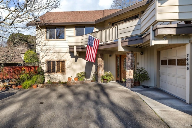 view of front of property with a balcony