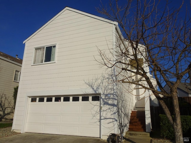 exterior space with a garage