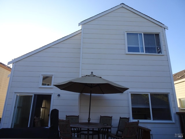 back of house featuring a patio