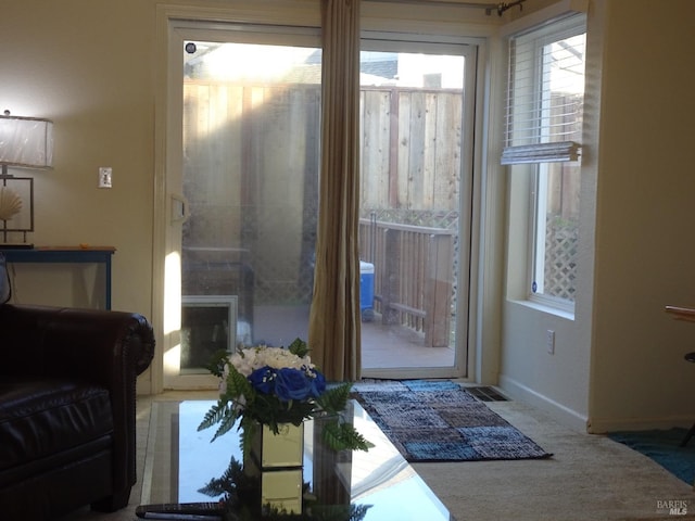 entryway with a fireplace