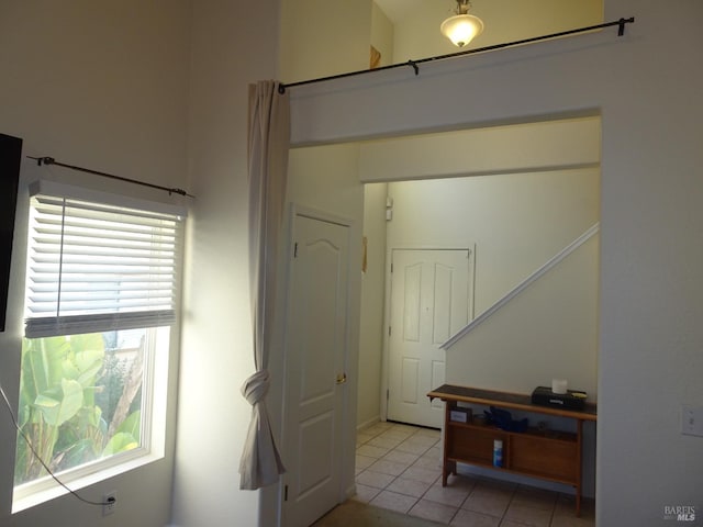 interior space with light tile patterned floors