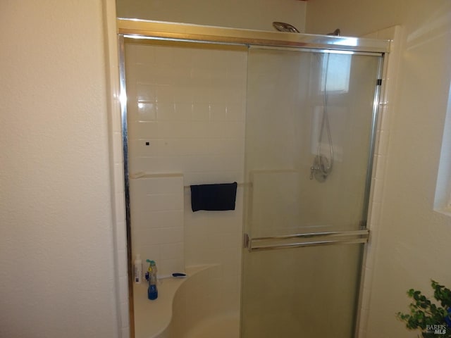 bathroom with an enclosed shower