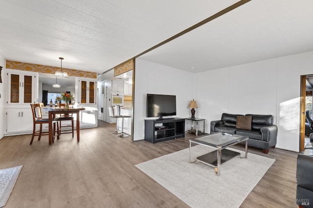 living room with hardwood / wood-style floors