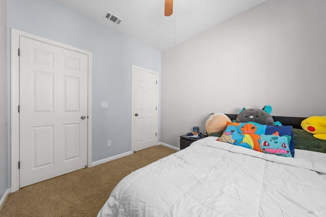 bedroom featuring ceiling fan, carpet floors, visible vents, and baseboards