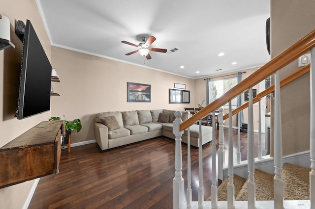 living room featuring recessed lighting, dark wood-type flooring, baseboards, stairs, and ornamental molding