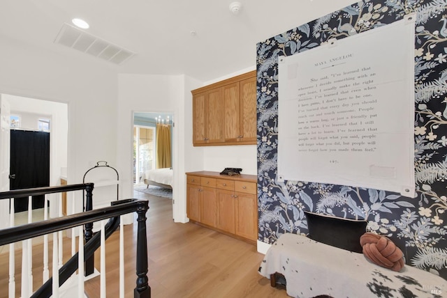 kitchen with light hardwood / wood-style flooring