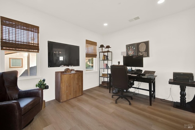 home office featuring hardwood / wood-style flooring