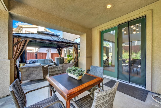 view of patio / terrace featuring a gazebo and outdoor lounge area