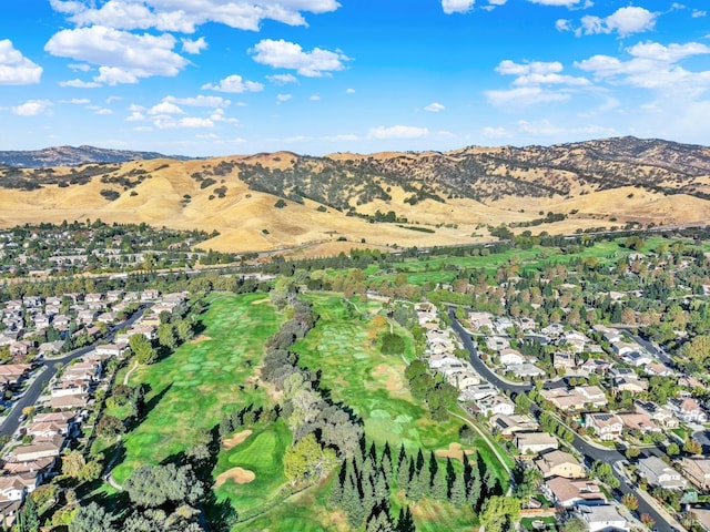 birds eye view of property featuring a mountain view