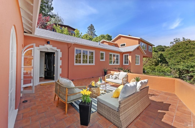 exterior space with an outdoor living space and a patio