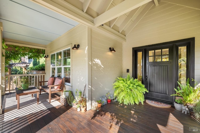 wooden terrace with a porch