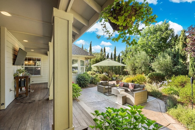 view of patio / terrace with outdoor lounge area and a deck