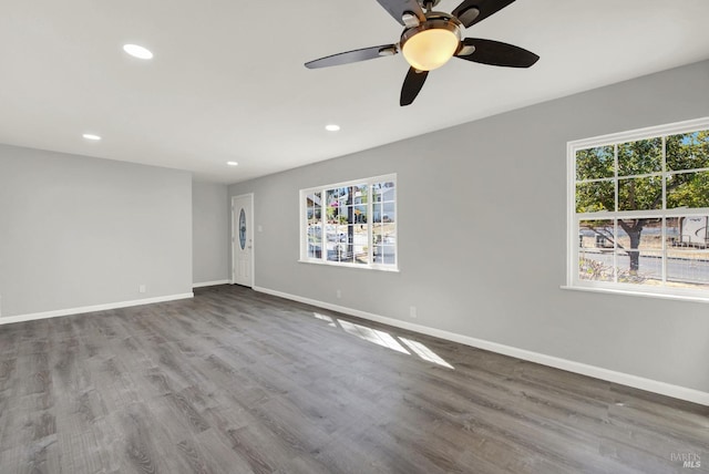 unfurnished room featuring hardwood / wood-style floors