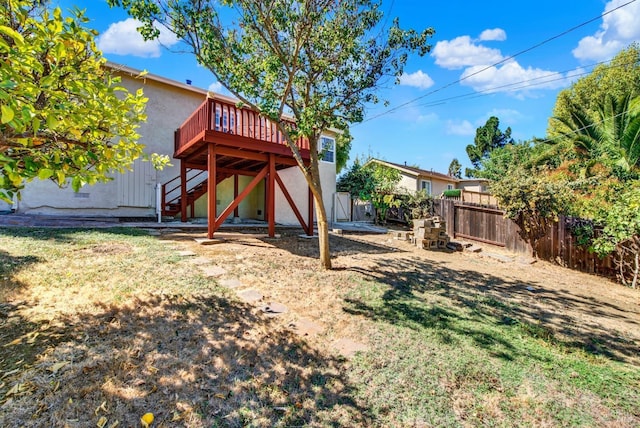 view of yard featuring a deck