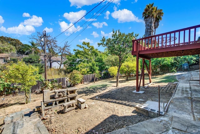 view of yard with a deck