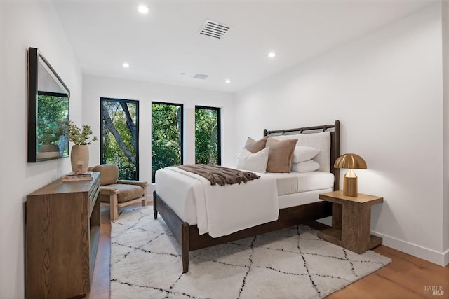 bedroom featuring light wood-type flooring