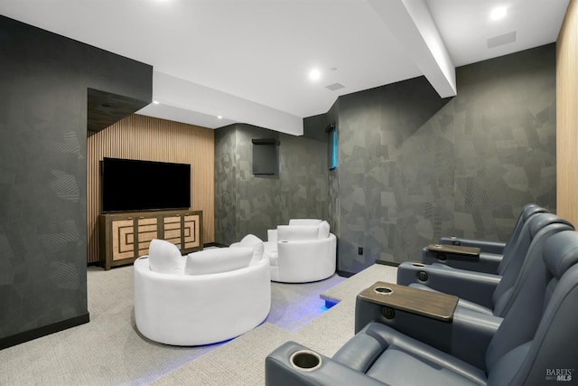 home theater with beamed ceiling