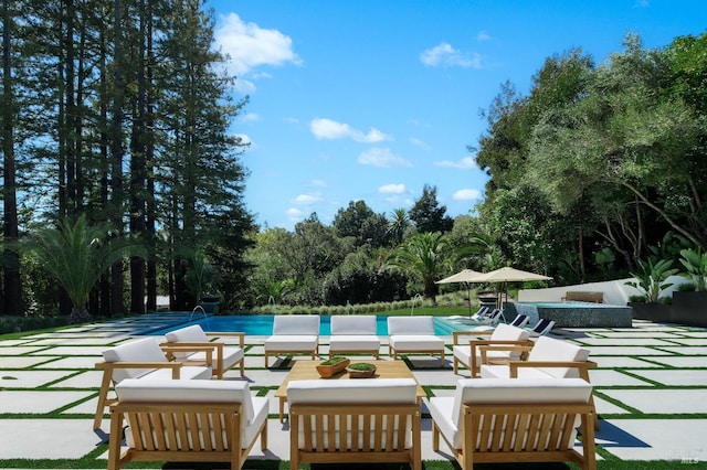 outdoor pool featuring a patio and outdoor lounge area