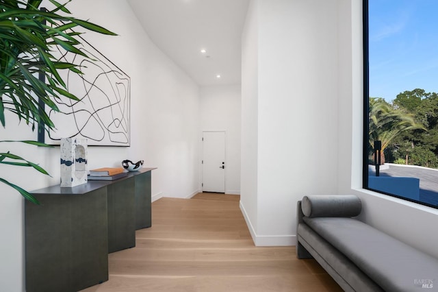 home office with recessed lighting, baseboards, and light wood finished floors