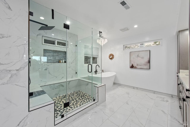 bathroom featuring vanity and plus walk in shower