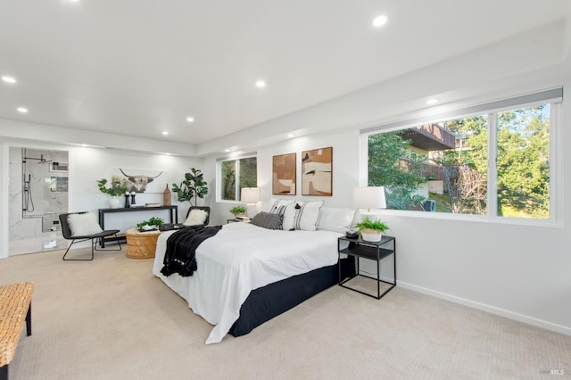 bedroom featuring light carpet