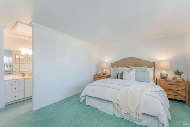 bedroom with baseboards, ensuite bathroom, crown molding, and light colored carpet