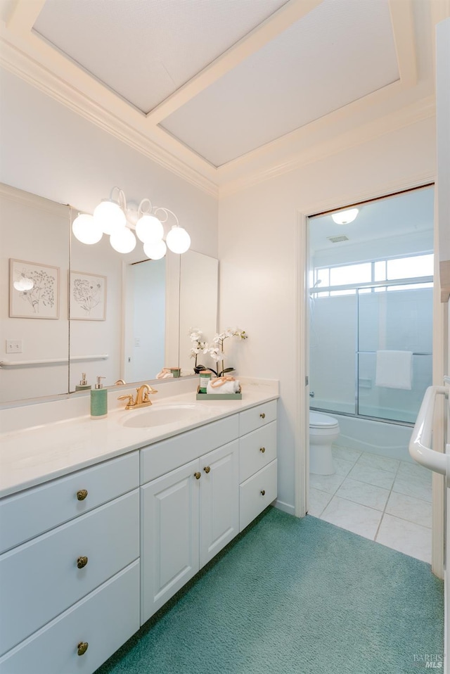 bathroom with enclosed tub / shower combo, tile patterned flooring, toilet, vanity, and ornamental molding