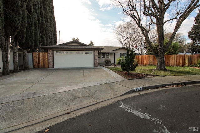 ranch-style house featuring a garage