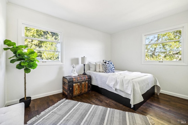 bedroom featuring dark hardwood / wood-style floors