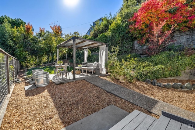 view of yard with a patio area, an outdoor living space, and a pergola