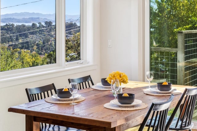 dining space with a mountain view