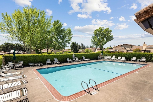 view of pool with a patio area