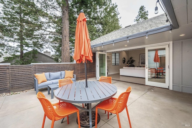 view of patio / terrace featuring outdoor dining area and an outdoor hangout area