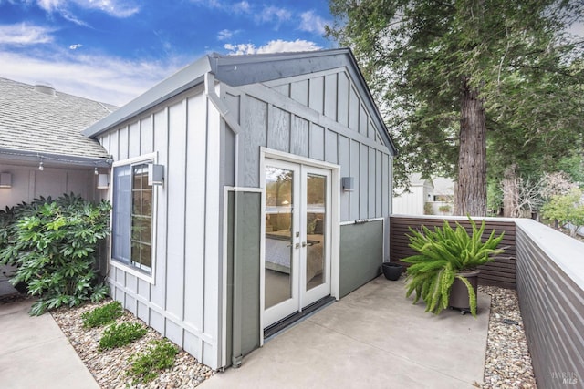 view of outbuilding featuring french doors