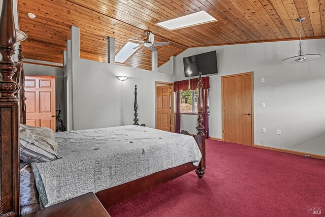 carpeted bedroom featuring ceiling fan, a skylight, high vaulted ceiling, and wooden ceiling