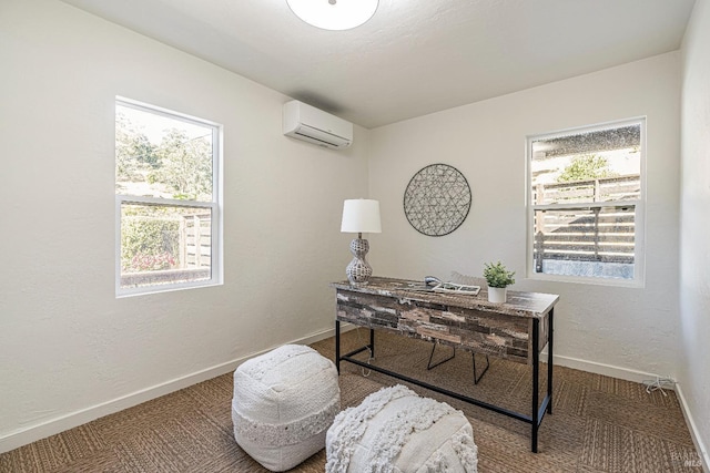 home office featuring a wall unit AC, a wealth of natural light, and carpet flooring