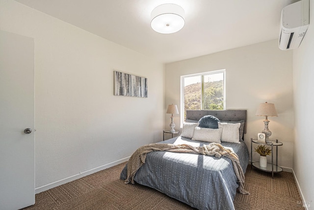 bedroom featuring a wall unit AC