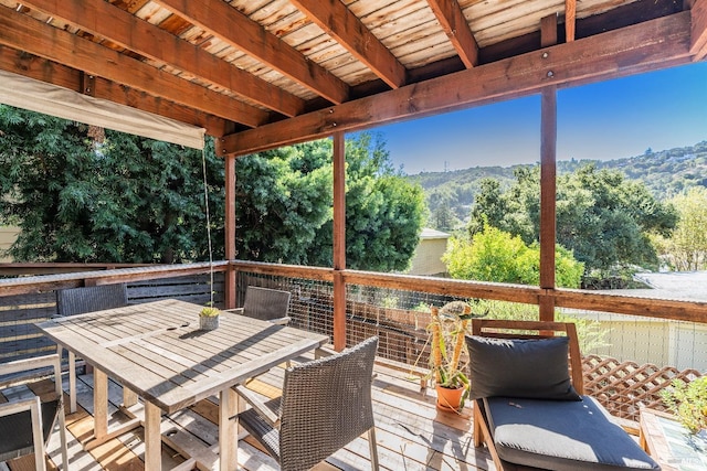 wooden terrace featuring a mountain view