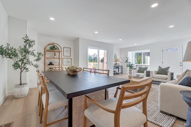 dining area featuring light hardwood / wood-style flooring