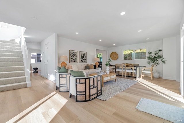 living room with light hardwood / wood-style flooring