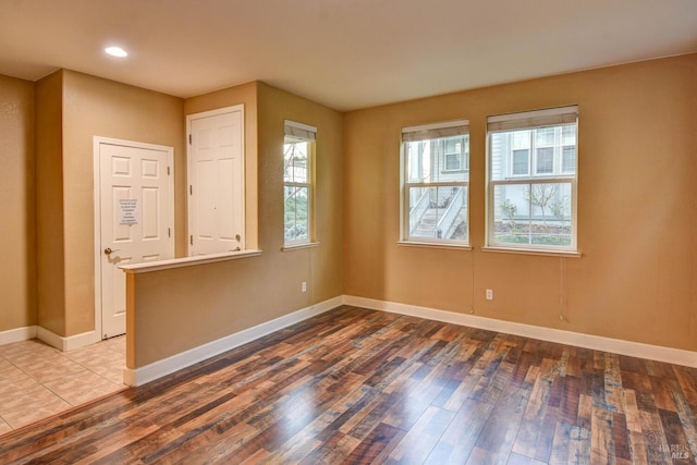 empty room featuring hardwood / wood-style floors