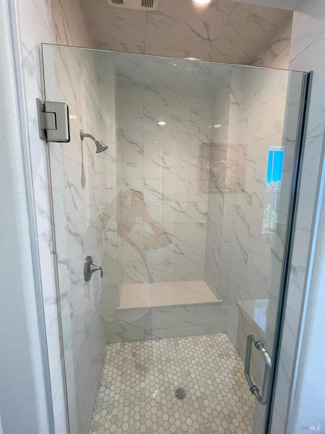 bathroom featuring walk in shower