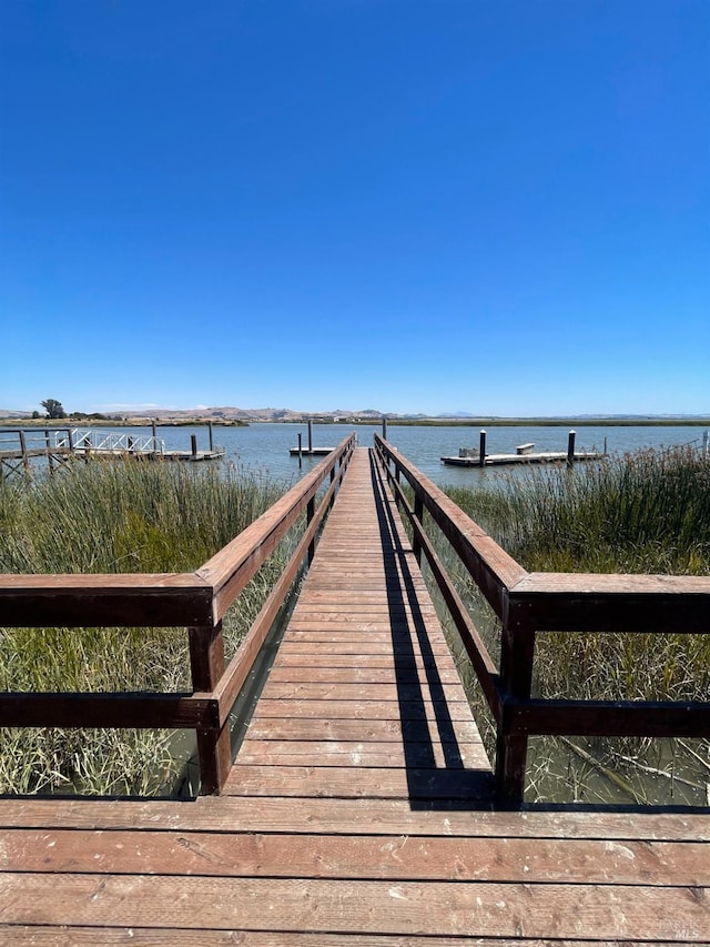 view of dock with a water view