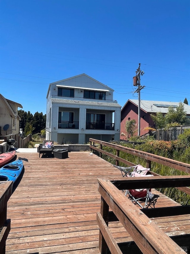 back of property with a deck