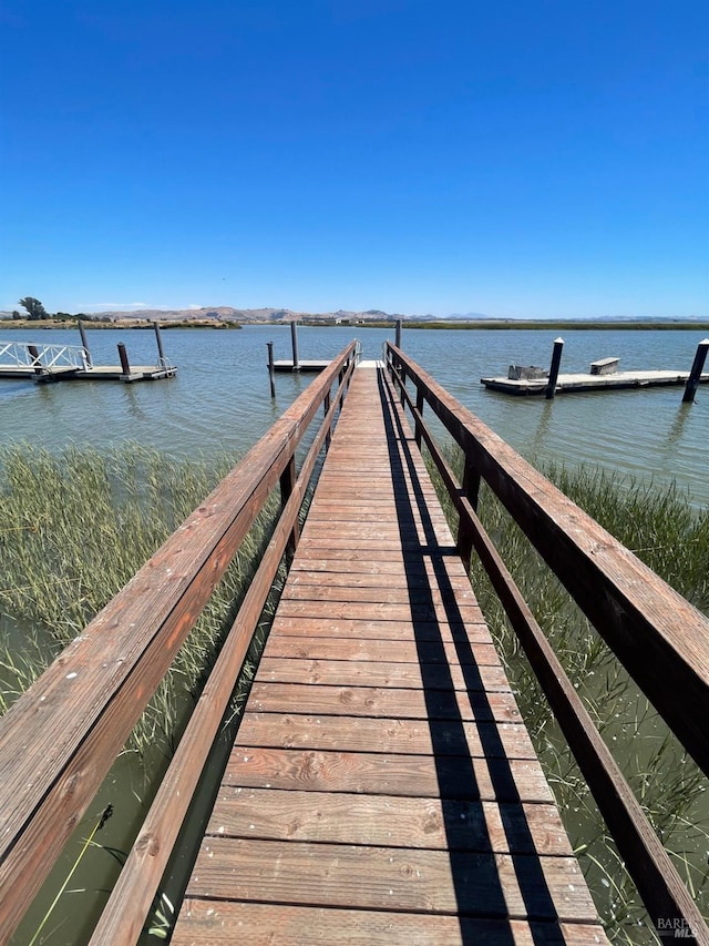 view of dock featuring a water view