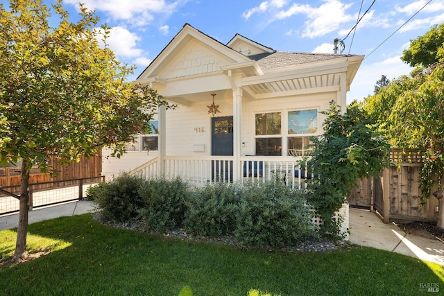 view of front of home with a front yard