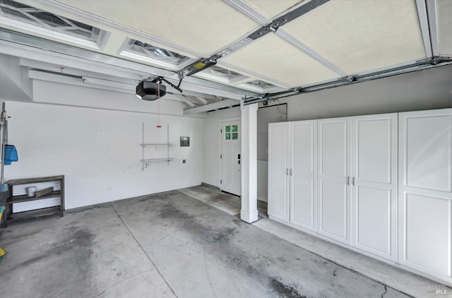 garage featuring a garage door opener