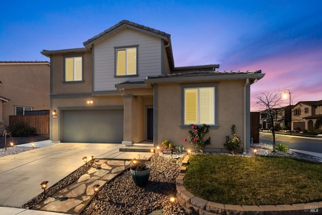 view of front of property featuring a garage