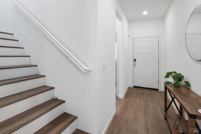 interior space with hardwood / wood-style floors